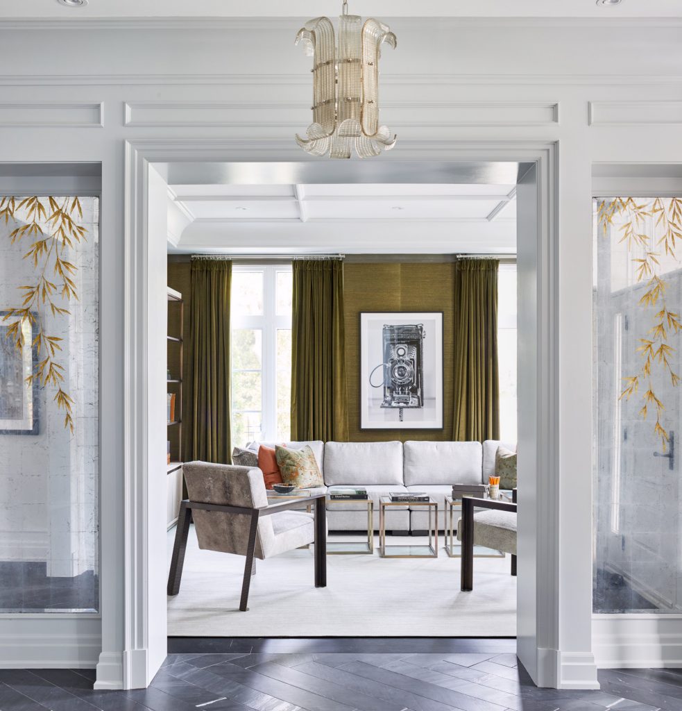 Interior photography looking through a doorway into a contemporary living room. Oakville Ontario